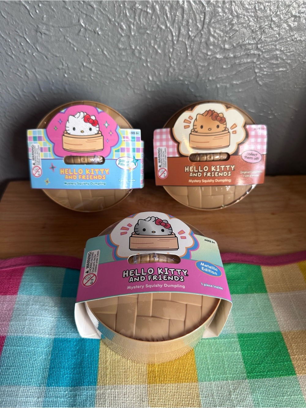 Set of Hello Kitty Mystery Squishy Dumplings Glitter, Metallic and Bao Slow Rise